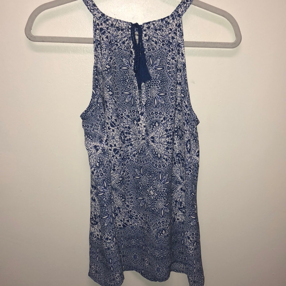 Blue and white patterned blouse